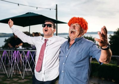 Guests singing and dancing during a wedding in Italy