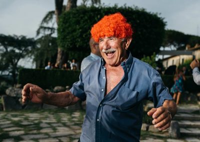 Funny guest dancing during a wedding in Italy