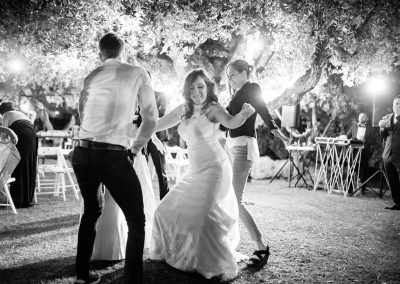 Guests dancing with the bride during a wedding in Italy