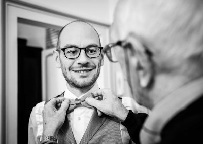 Groom preparation with his father, wedding photography