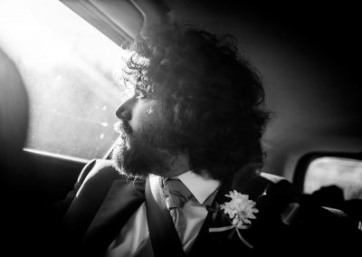 Groom in the car in a destination wedding Italy