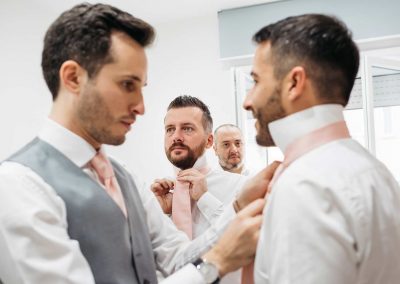 Groom preparation with best men, picture shot in documentary wedding photography style