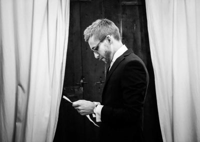 Groom reading his speech, picture shot in documentary wedding photography style