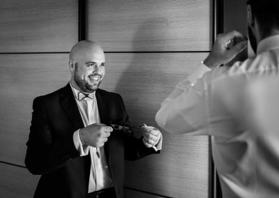 Groom preparation with best man, picture shot in documentary wedding photography style